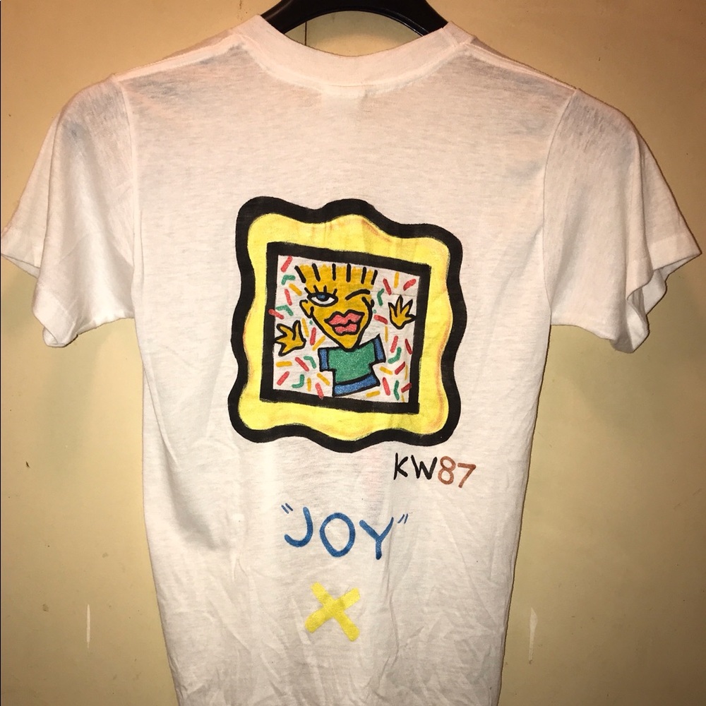 KW87 joy Tshirt size: medium 27”1/2 top to bottom 17”1/2 pit to pit used